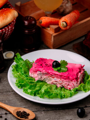 shuba-salad-with-herring-with-olive-on-the-table