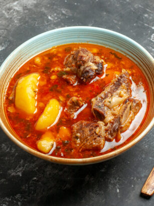 top-view-delicious-meat-soup-with-potatoes-inside-plate